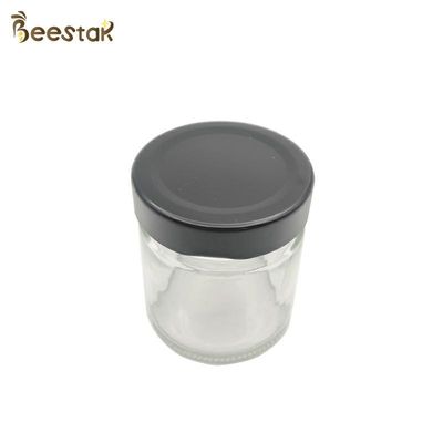 satın al Bal Ambalajı İçin 250ml Bal Kavanoz ve Kaşık Cam Şişe Çevrimiçi üretim